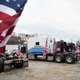 Demonstrators prepare to depart Hagerstown Speedway in Hagerstown, Maryland, on March 7, 2022, during “The People’s Convoy” event. - The convoy has called on US President Joe Biden to end vaccine and other Covid-19 pandemic mandates while modeling themselves after Canadian drivers who had occupied the center of Ottawa in a similar protest.